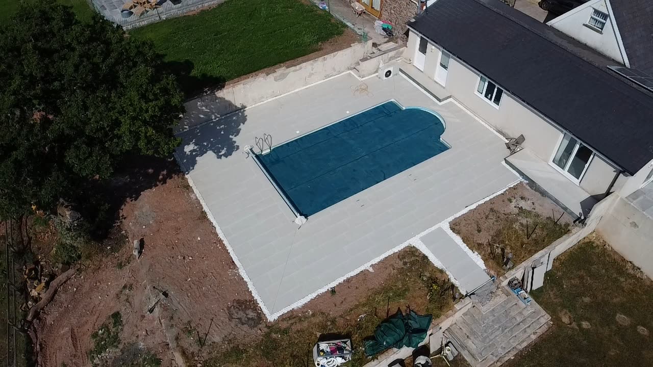 Aerial view of a completed patio and external works around a pool